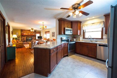 Updated in 2018, the kitchen features granite coun