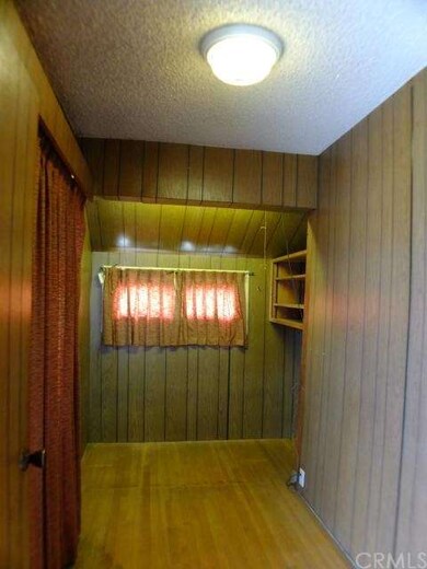 Room immediately to the left after entering