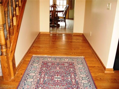 Center Hall foyer with hardwood floors