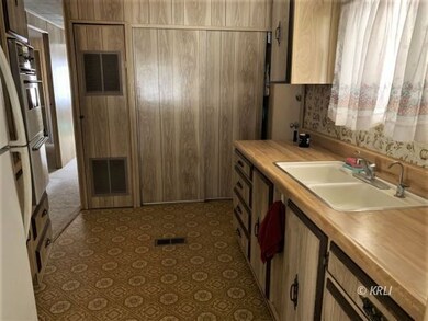 Large Kitchen with Built In Laundry