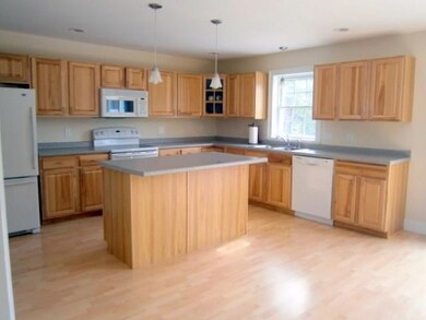 Kitchen with refrigerator,...