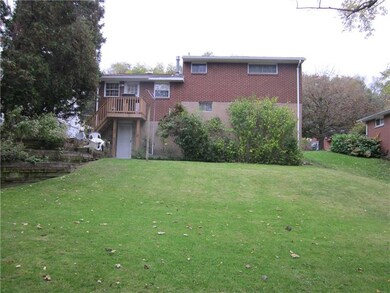 level deep yard. Newer deck off dining room.