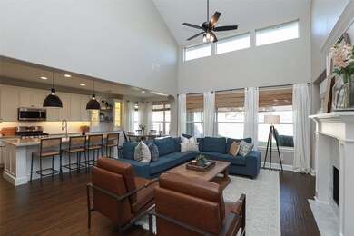 2 Story family room! overlooks covered back porch!