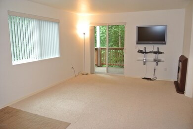 Living Area with Slider and Fireplace