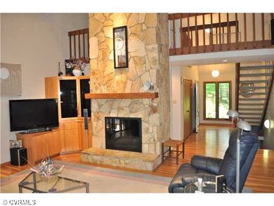 Den/Family/Great Room - The soaring, 2-story stone