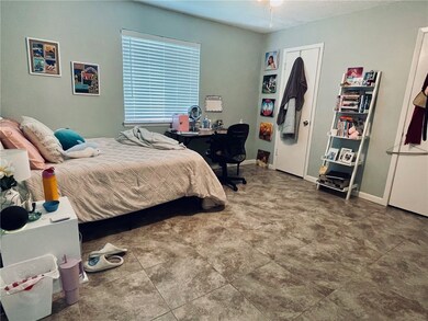 Bedroom featuring baseboards