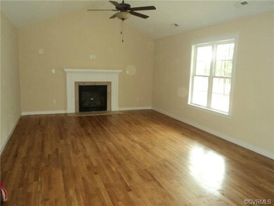 Family room with gas fireplace, hardwood floor, ca