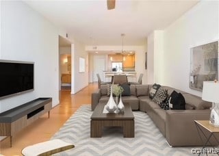 Living area with wood finished floors
