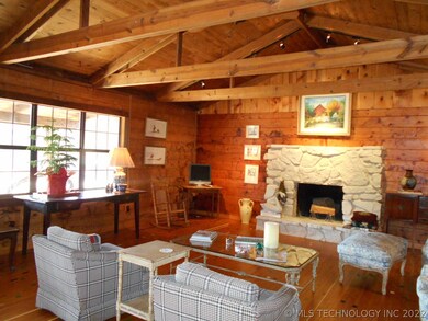 Open living, stone WB FP, maple flooring, beamed c