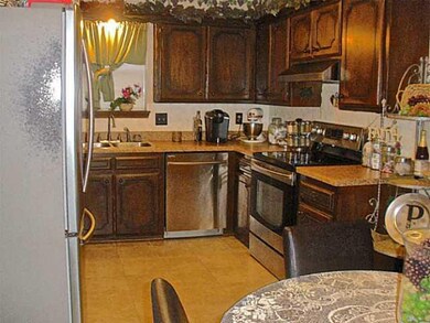 Kitchen. Updated counter tops, appliances, floorin