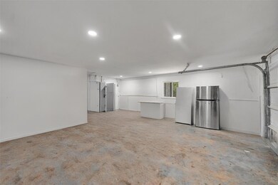 Oversized 2 car garage with A/C and recessed light