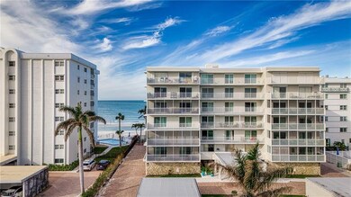 View of apartment building / complex with a water view