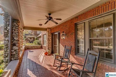 Deep front porch features a covered and uncovered 