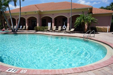 Community pool featuring a patio area