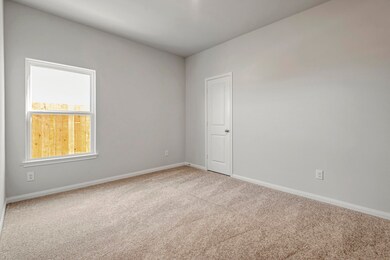 The two additional bedrooms in the home are perfec