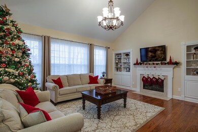 View of the Fireplace in the living area. Hardwood floors through out lower level.
