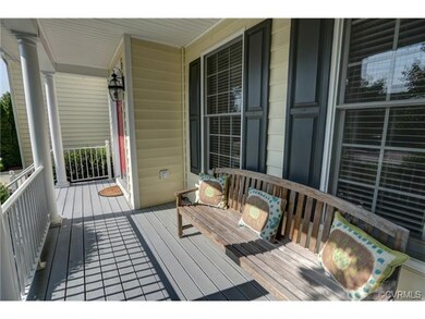 Sit and relax on this welcoming front porch!