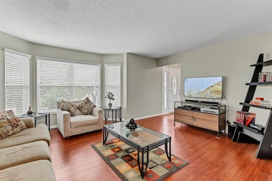 Big bay window with easy care wood laminate floors