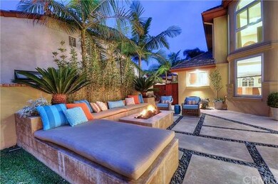 Courtyard with built in sofa lounge and firepit