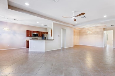 Unfurnished living room with light tile patterned 