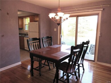 Large, spacious dining room with newly finished wo