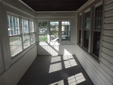 The front enclosed porch.