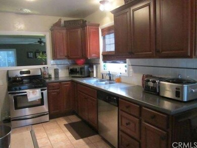 Kitchen with view into Living Room & Dining Area