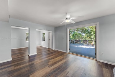GREAT ROOM LEADING OUT TO BRAND NEW DECK