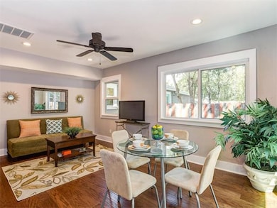 Dining space featuring wood finished floors, recessed lighting, and ceiling fan