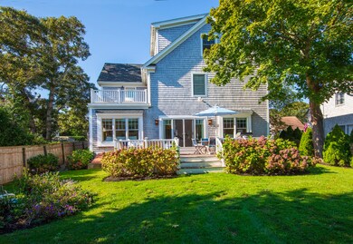 rear of home with 1st floor and 2nd floor deck