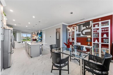 Dining room with crown molding and sink