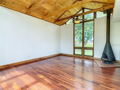 There is a fireplace in the corner which adds a wa