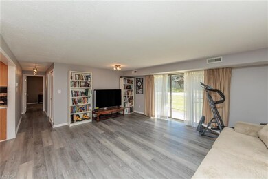 Unfurnished living room with wood-type flooring
