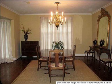 Elegant formal dining room with huge bay window an