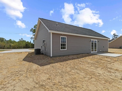 Back of house featuring a patio and central air condition unit