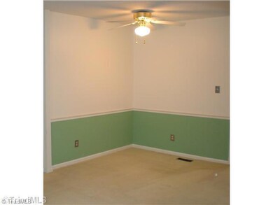 Dining Room. Dinning area is convenient to the kitchen, yet still within view of the fireplace.