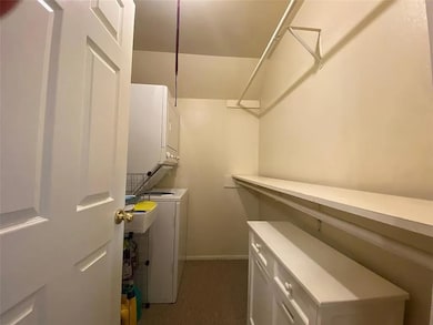 Walk-in Closet with Washer and Dryer