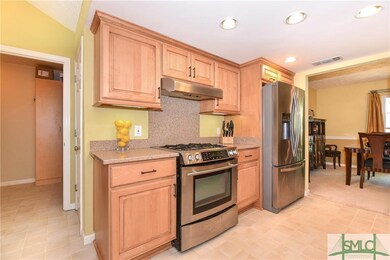 Updated kitchen with solid surface counters, grani