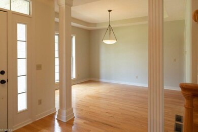 Formal Dining Room with fluted columns; trayed cei