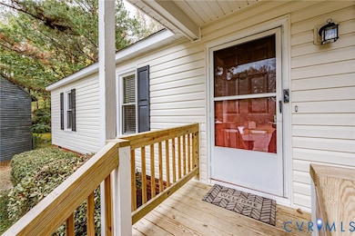Property entrance with a deck