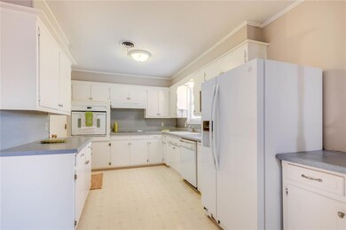 GOOD COUNTERTOP SPACE AND PLENTY OF CABINETS..