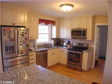 Kitchen - Updated kitchen with custom cabinets and