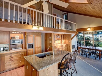 Kitchen with new granite island and sleeping loft 