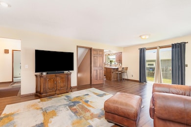 Sliders off living room to deck with Sunsetter shade