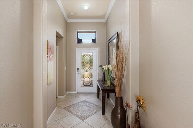 11 foot ceilings in the foyer with crown molding a