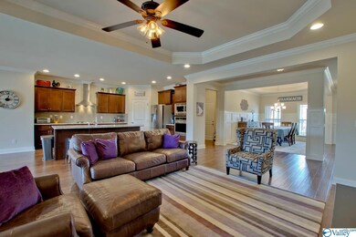 Trey ceilings in the large great room complete with gas fireplace.