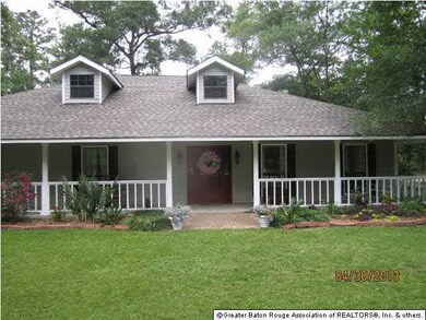 Come relax on the Acadian style porch