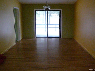 Wood floors; sliding door opens to covered deck in back.