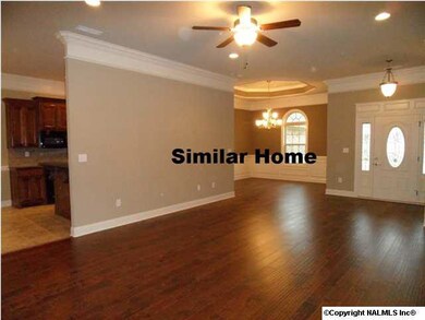 View of open floor plan with family and dining room.