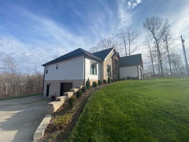 176 Oak Crest Dr, Tennessee Ridge, TN 37178 - photo 3